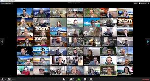 an image of a large video meeting with many tiny webcam images in an array